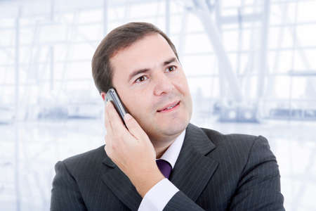 happpy business man on the phone, at the officeの写真素材