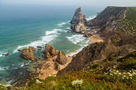 View of Praia da Ursa atlantic coast rocky cliff beach at Cabo da Roca, Sintra, Lisbon. Portugalの写真素材
