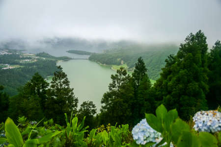 Picturesque view of the Lake of Sete Cidades, a volcanic crater lake on Sao Miguel island, Azores, Portugalの写真素材