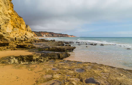 Empty beach in Albufeira. This beach is a part of famous tourist region of Algarve. Portugalの写真素材