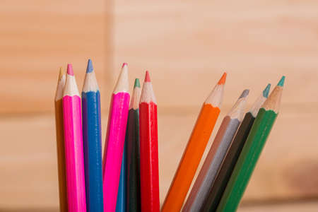 Wooden colorful pencils, on wooden tableの写真素材