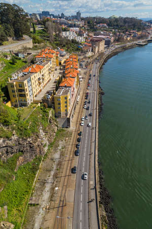 Porto, Portugal: 06, March, 2022 - View of Porto city historical centre with Douro River etween Ribeira and Vila Nova de Gaia town, North of Portugalのeditorial素材