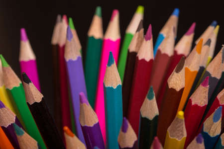 Wooden colorful pencils, on a dark backgroundの写真素材