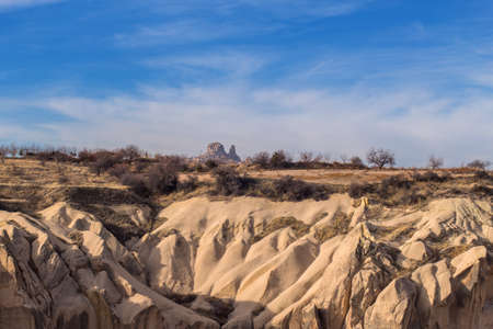Volcanic cliffs and rock formations at Cappadocia, Anatolia. Turkeyの写真素材