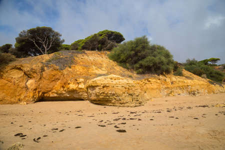 Empty beach in Albufeira. This beach is a part of famous tourist region of Algarve. Portugalの写真素材