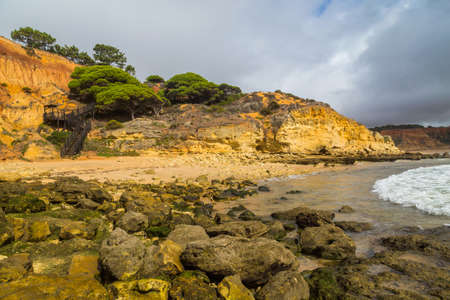 Empty beach in Albufeira. This beach is a part of famous tourist region of Algarve. Portugalの写真素材
