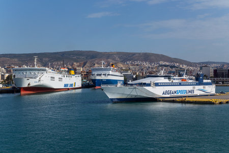 Pireas Greece: Ferry boats cruise ships docking at the port of Piraeus Greece. The port of Piraeus is the largest passenger port in Europe and the third largest in the world.のeditorial素材