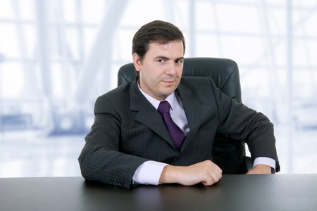 young business man on a desk, at the officeの写真素材