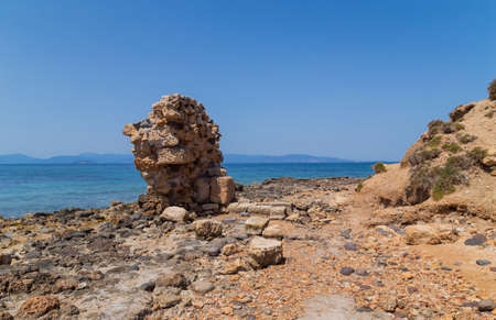 The coast of Aegina island with clear and blue waters of Mediterranean sea in the Saronic gulf, Greece.の写真素材