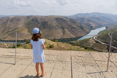 Young girl on the top of the Coa Museum in Vila Nova de Foz Coa. Archeological Museum of the Coa Valley. Portugalのeditorial素材