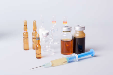 syringe with ampules of drugsの写真素材
