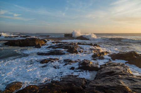 Foz during a storm on the ocean at sunset in Atlantic ocean, Porto, Portugal.の写真素材