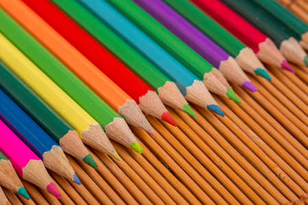 Wooden colorful pencils, on wooden tableの写真素材