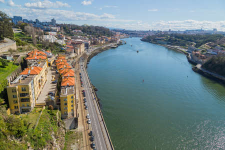 View of Porto city historical centre with Douro River etween Ribeira and Vila Nova de Gaia town, North of Portugalの写真素材