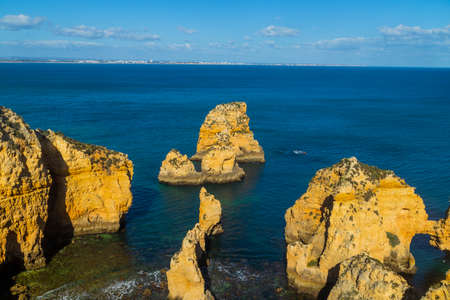 Ponta da Piedade cliffs near Lagos, Portugal. Beautiful seascape with natural rock formations in the Algarve, Portugalの写真素材