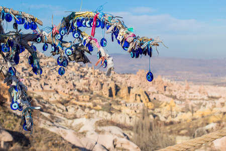 View of evil eye amulet on mountain background in Cappadocia, Turkeyの写真素材