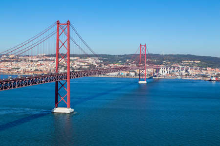 The 25 de Abril Bridge (Ponte 25 de Abril) is a suspension bridge in Lisbon over Tagus river, in Portugal.の写真素材