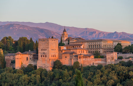 View of Alhambra Palace in Granada, Spain, with Sierra Nevada mountains on the backのeditorial素材