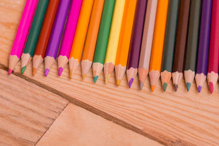 Wooden colorful pencils, on wooden tableの写真素材