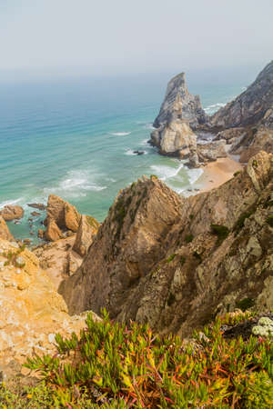 View of Praia da Ursa atlantic coast rocky cliff beach at Cabo da Roca, Sintra, Lisbon. Portugalの写真素材