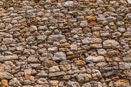 Background of old vintage stone wall. Wall decoration to be beautiful and strong with natural stone.の写真素材