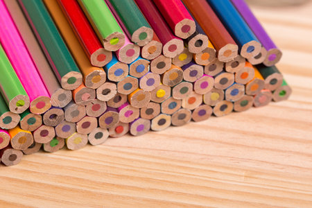 Wooden colorful pencils, on wooden tableの写真素材