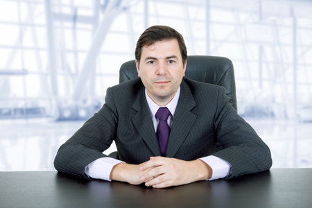 young business man on a desk, at the officeの写真素材