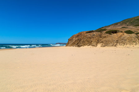 Beautiful empty beach in Algarve, Portugalの写真素材