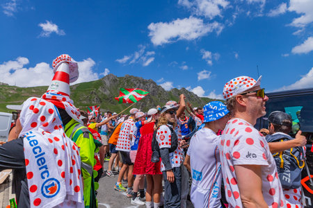 Col du Tourmalet, France - July 06 2023: Cycling fans waiting for the buch at the top of the Col du Tourmalet in Pyerenees mountains during the stage 6 of Le Tour de France 2023のeditorial素材