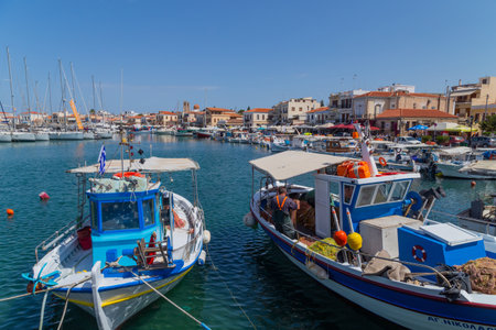 Greece, Athens. Moored pleasure yachts and fishing boats in the Port of Piraeus. Warm sunny day by the sea in Greece.のeditorial素材