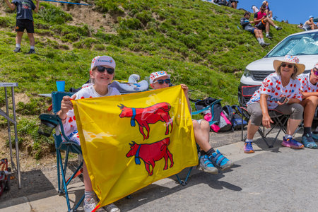 Col du Tourmalet, France - July 06 2023: Cycling fans waiting for the buch at the top of the Col du Tourmalet in Pyerenees mountains during the stage 6 of Le Tour de France 2023のeditorial素材