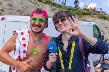 Col du Tourmalet, France - July 06 2023: Cycling fans waiting for the buch at the top of the Col du Tourmalet in Pyerenees mountains during the stage 6 of Le Tour de France 2023のeditorial素材
