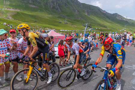Col du Tourmalet, France - July 06 2023: Riders climbig the road to Col du Tourmalet in Pyerenees mountains during the stage 6 of Le Tour de France 2023.のeditorial素材