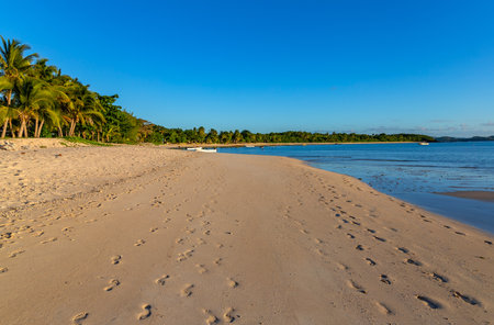 Nacula, Fiji: Boats in the stunning idyllic blue lagoon beach in the Yasawa island in Fiji in the south Pacific oceanのeditorial素材