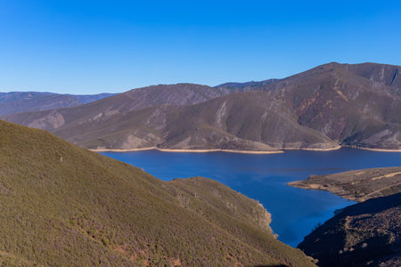 Mountain landscape with a lake, mountains near Puebla de Sanabria, Zamora, Spainの写真素材