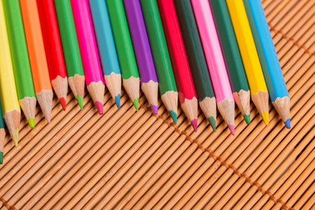 Wooden colorful pencils, on wooden tableの写真素材