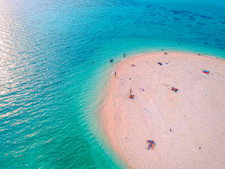 The top view beach with people doing activies ,swimming and sunbathing in Koh Lipe ,Thailand.の写真素材