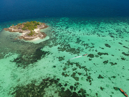 A top view over Koh Lipe island, Thailand with crystal clear water.の写真素材