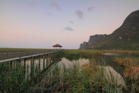 Outdoor Pavilion in lake view park in sunset timeの写真素材
