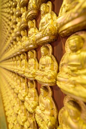 NonTaburi,Thailand - Sep 25 , 2016 : golden Sculpture wall in Dragon Temple Kammalawatのeditorial素材