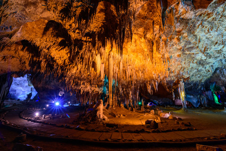 Stalactite stalactites with color lighting in caveの写真素材