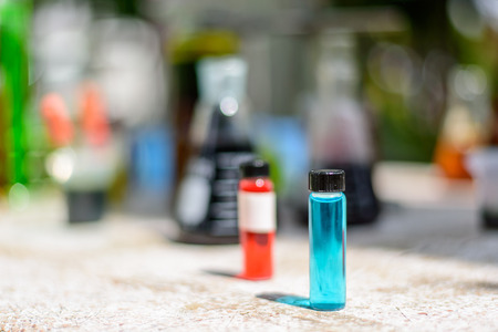 Blue water in test tube in lab