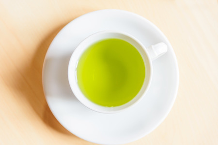 hot green tea in a cupの写真素材