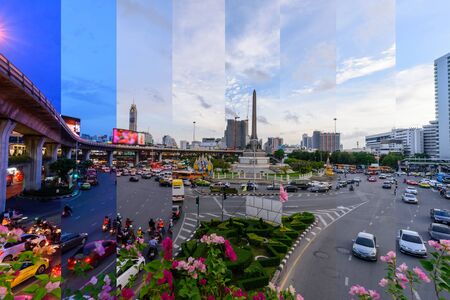 Different shade color of victory monument landmark in Bangkok with blur light of traffic car