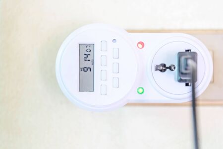 Digital electric plug timer for auto ON/OFF electronicsの写真素材