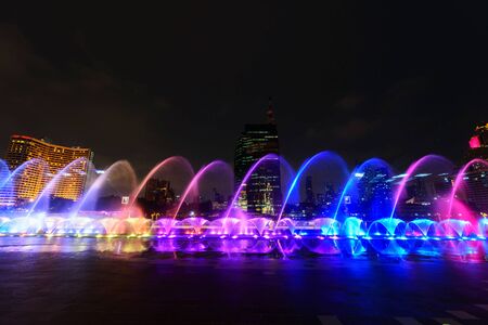 the fountain showing with lighting in night timeの写真素材