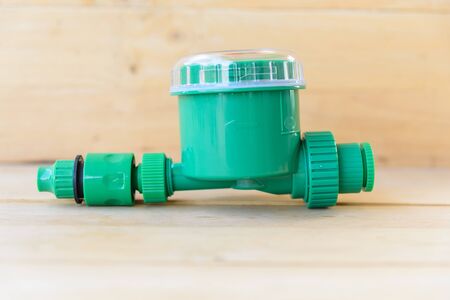 irrigation timer on wood plateの写真素材