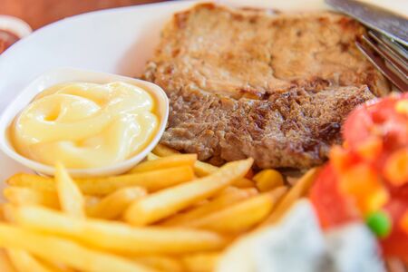 Pork steak in dishの写真素材