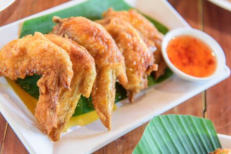 Chicken wing fried with sauceの写真素材