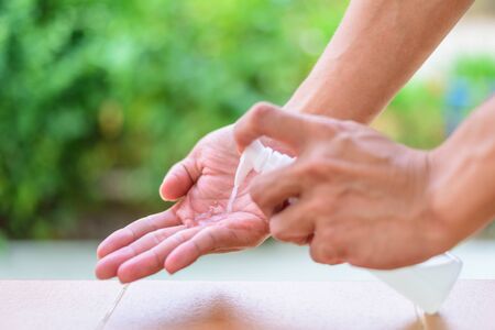 Cleaning hand by sanitizer gel / cleaning hand from corona virusの写真素材